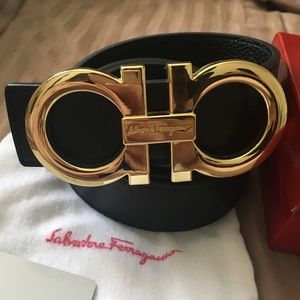 Black Ferragamo belt with gold buckle
