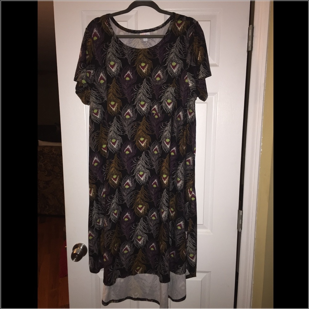 NWOT Peacock feathered lularoe Carly