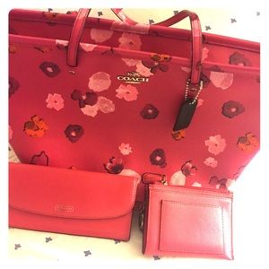Coach pink tote and two Coach wallets