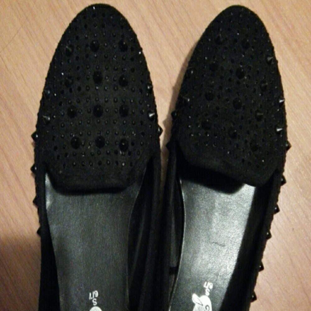 Spiked black flats