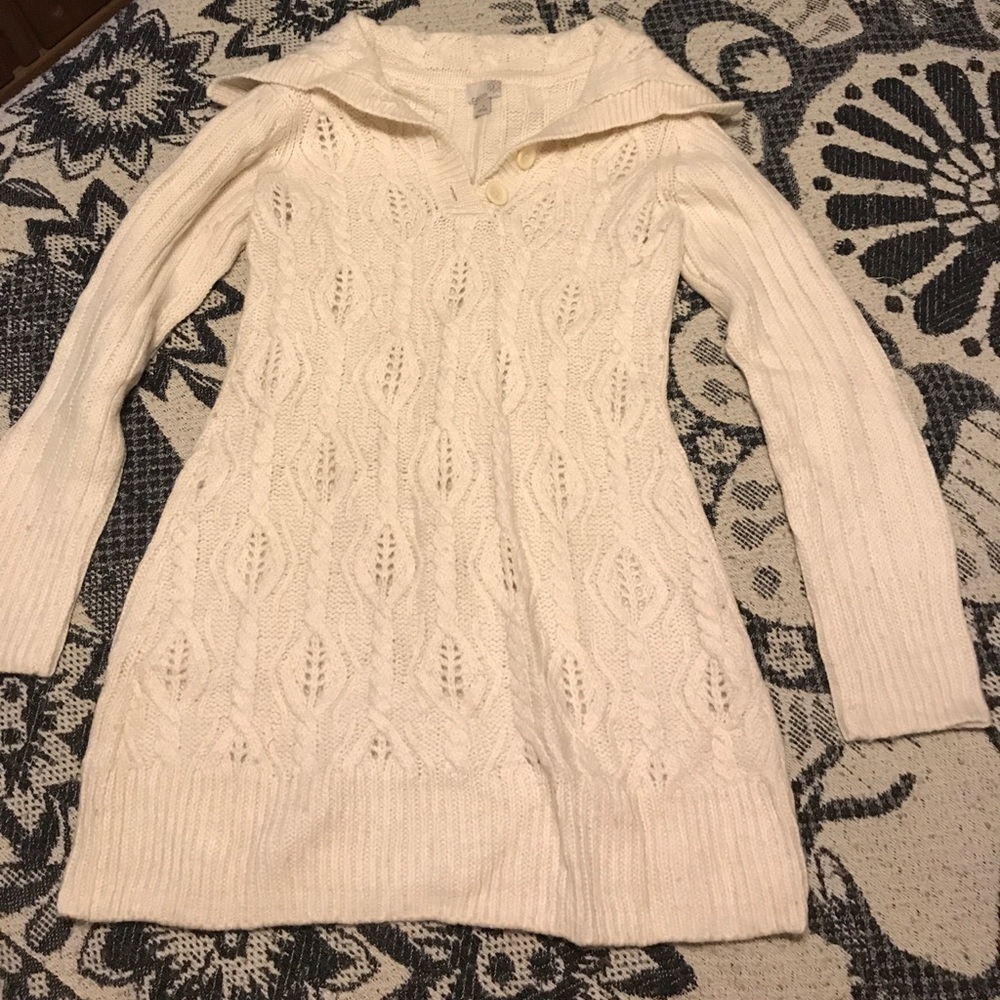 Woman's long sweater.