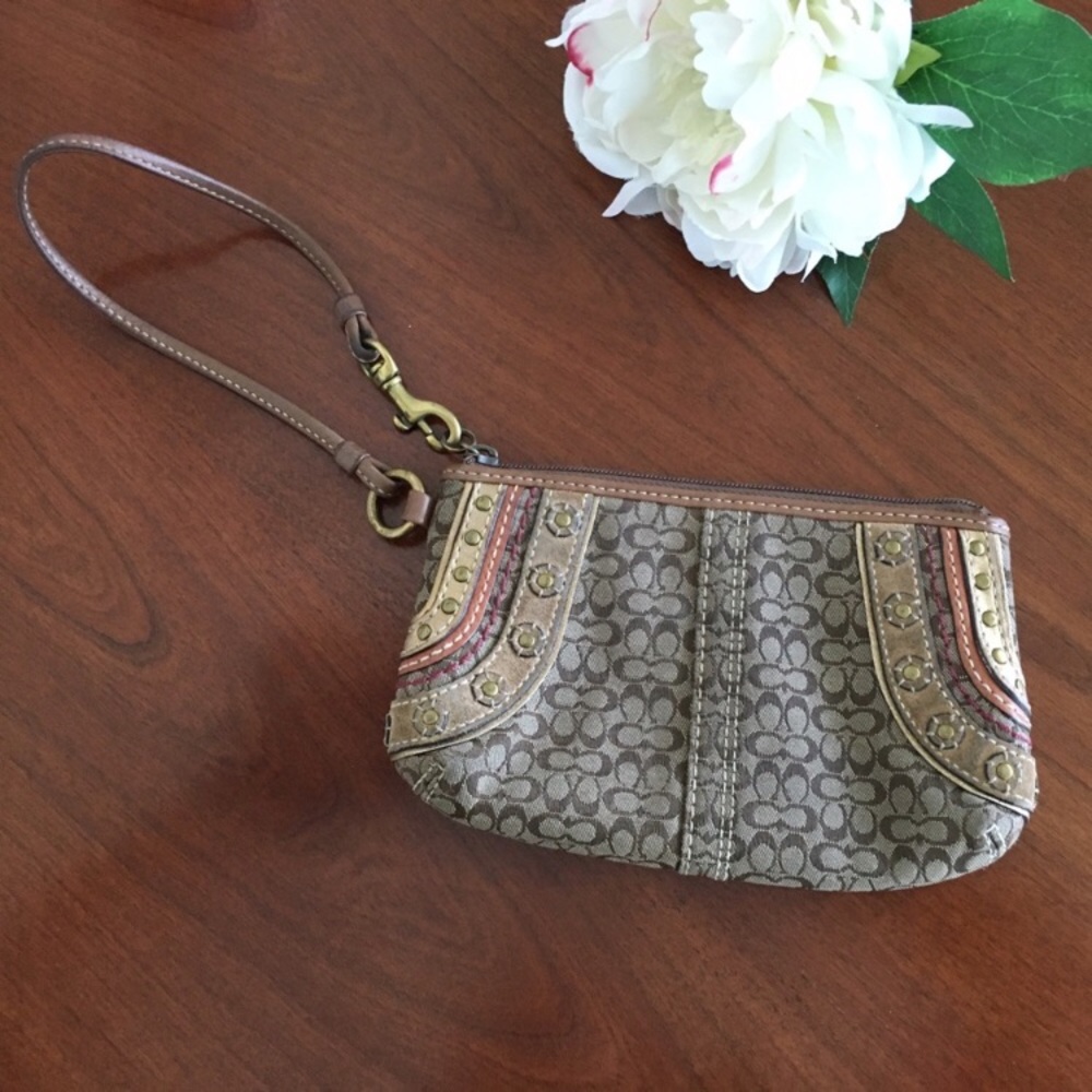 Coach brown signature wristlet leather accents