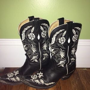 Black embroidered Tony Lama cowboy boots.