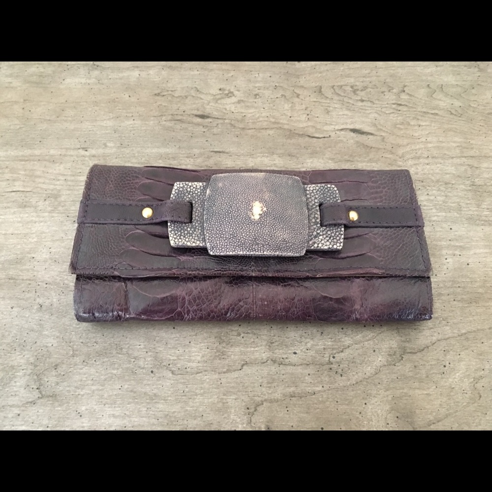 Purple leather R&Y Augousti wallet