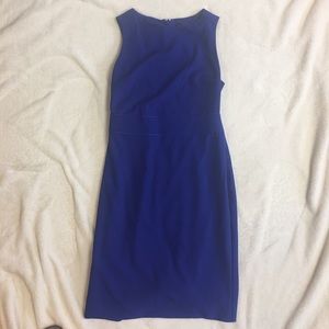 Cute dress fully lined.Shoulder to hem 35 inches