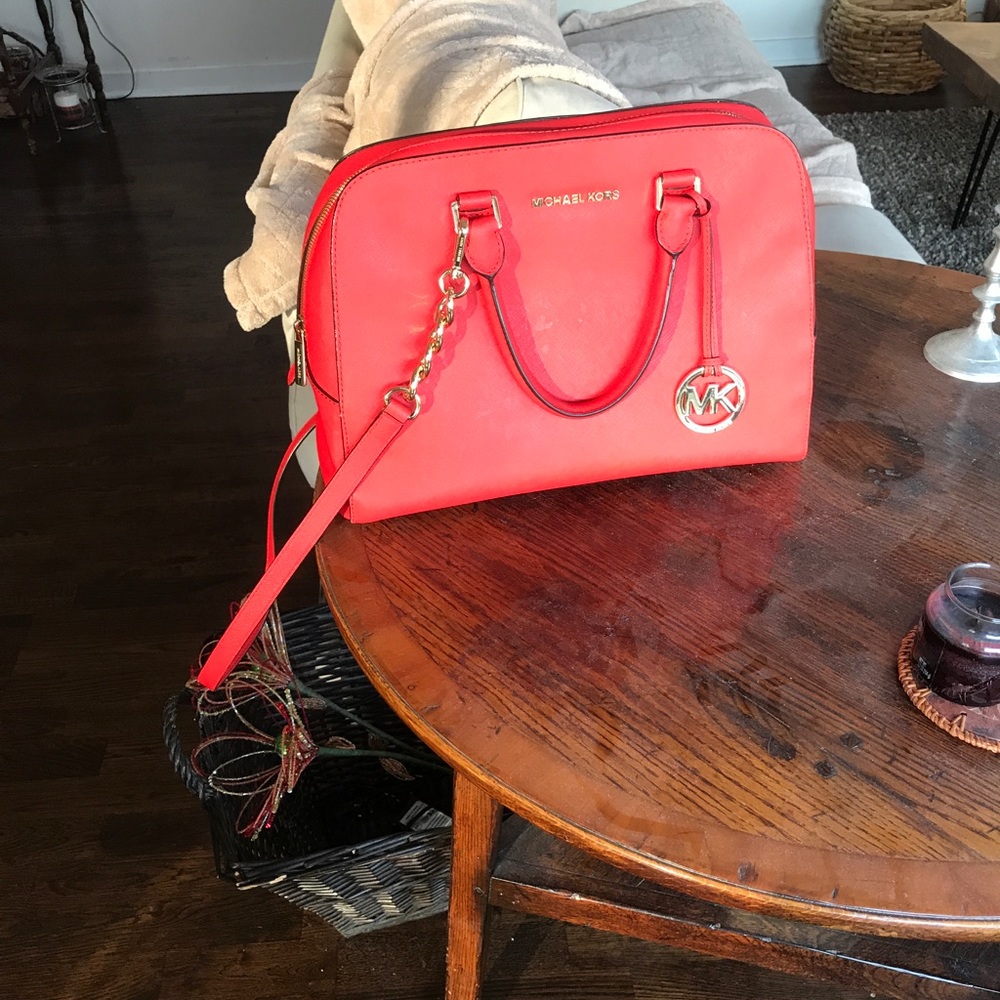 Red michael kors handbag