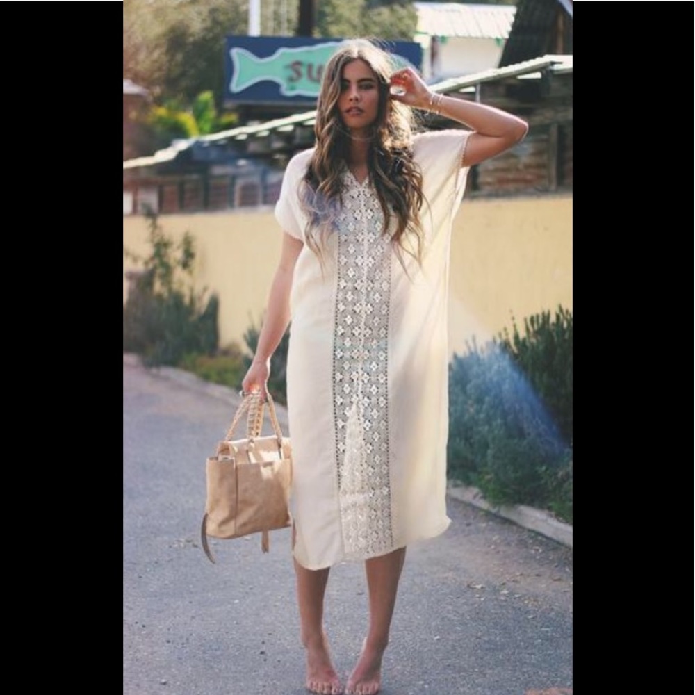 Cotton and lace dress or coverup.
