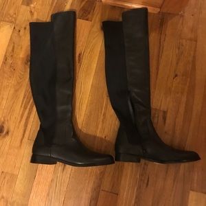 Tall black boots