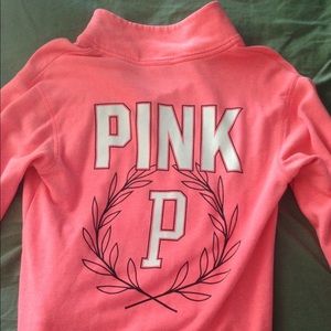 Pink pullover jacket.