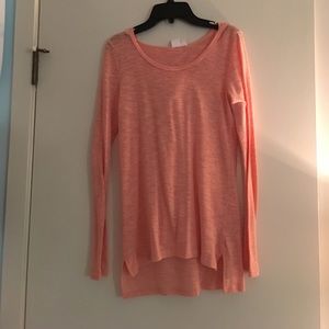 Pink long-sleeved, hooded shirt