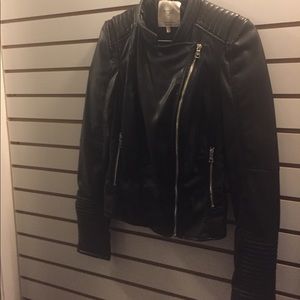 Fuax leather jacket in black by Zara