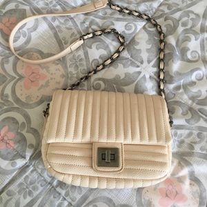 Nude cross body bag