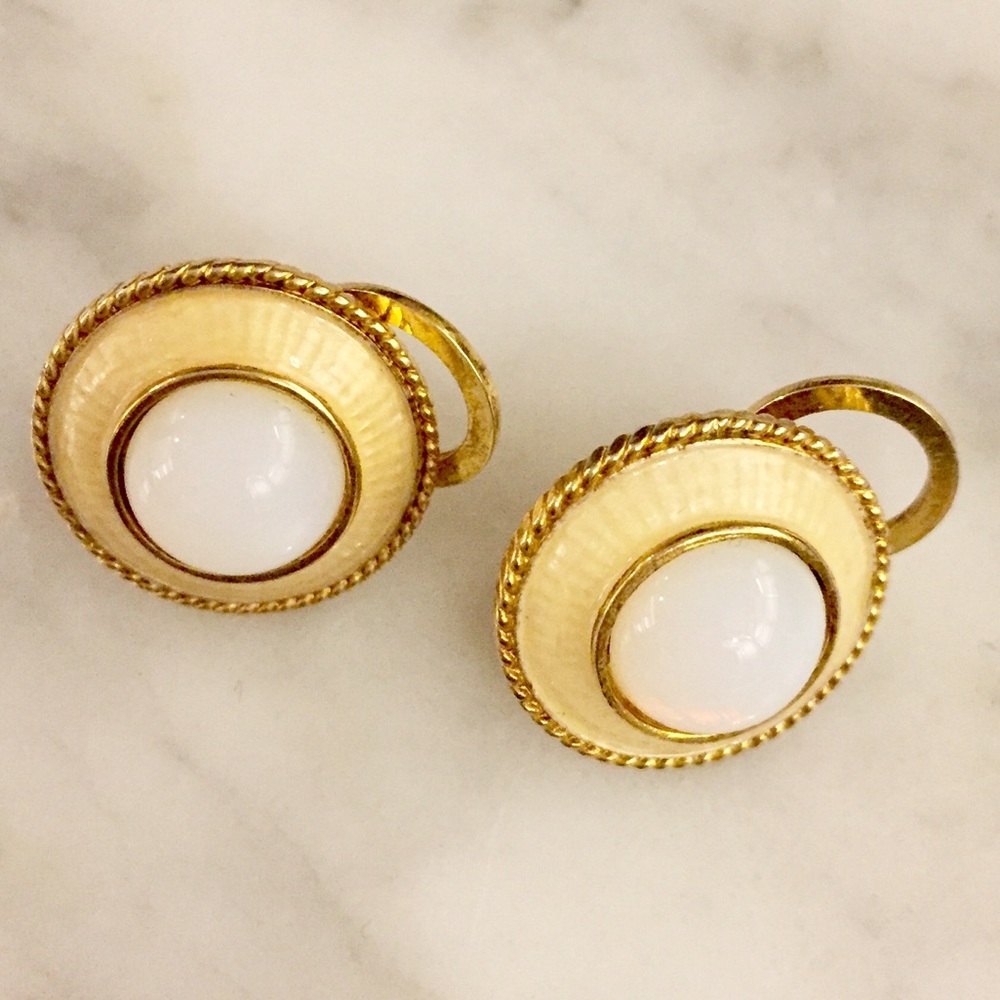 Museum of Modern Art earrings. RC MMA inscription.