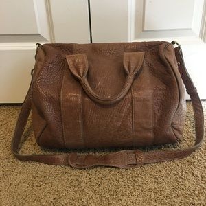 leather studded duffle purse