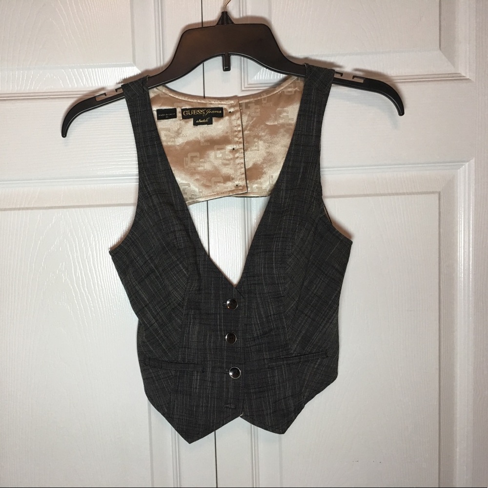 Guess vest with gold colored lining