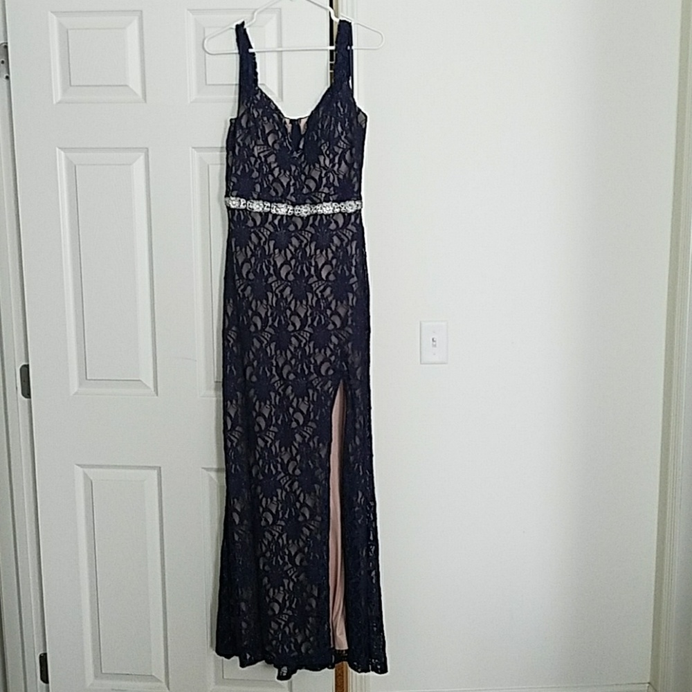 Navy lace dress with side slit and deep neckline