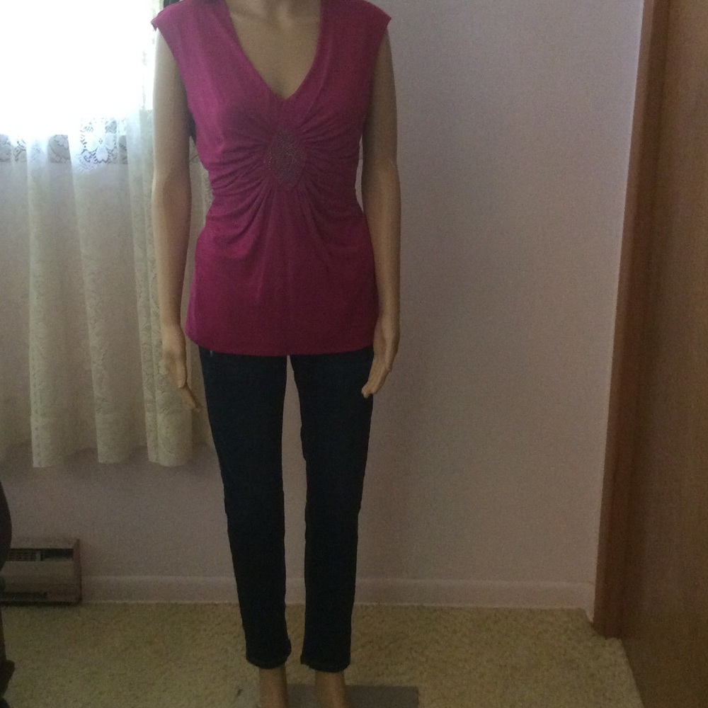 Never worn WHBM distressed jeans.