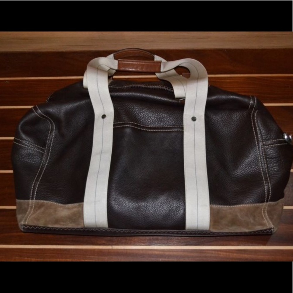 Large brown leather Coach duffle bag suede lining