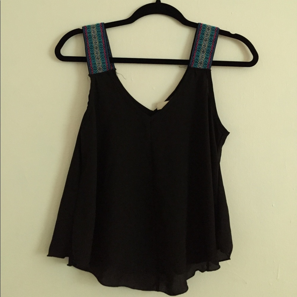Tank top with tribal straps