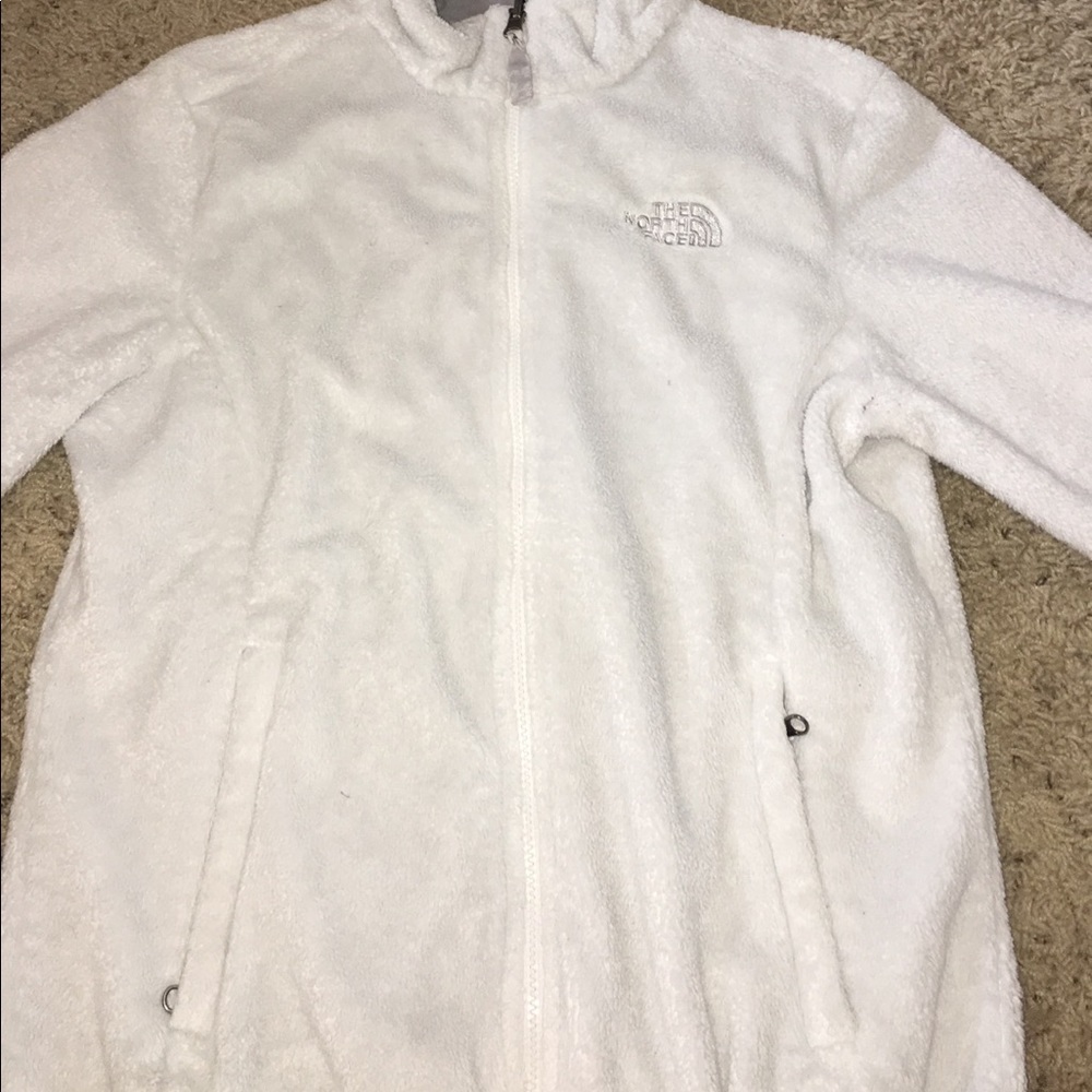 white fleece north face jacket