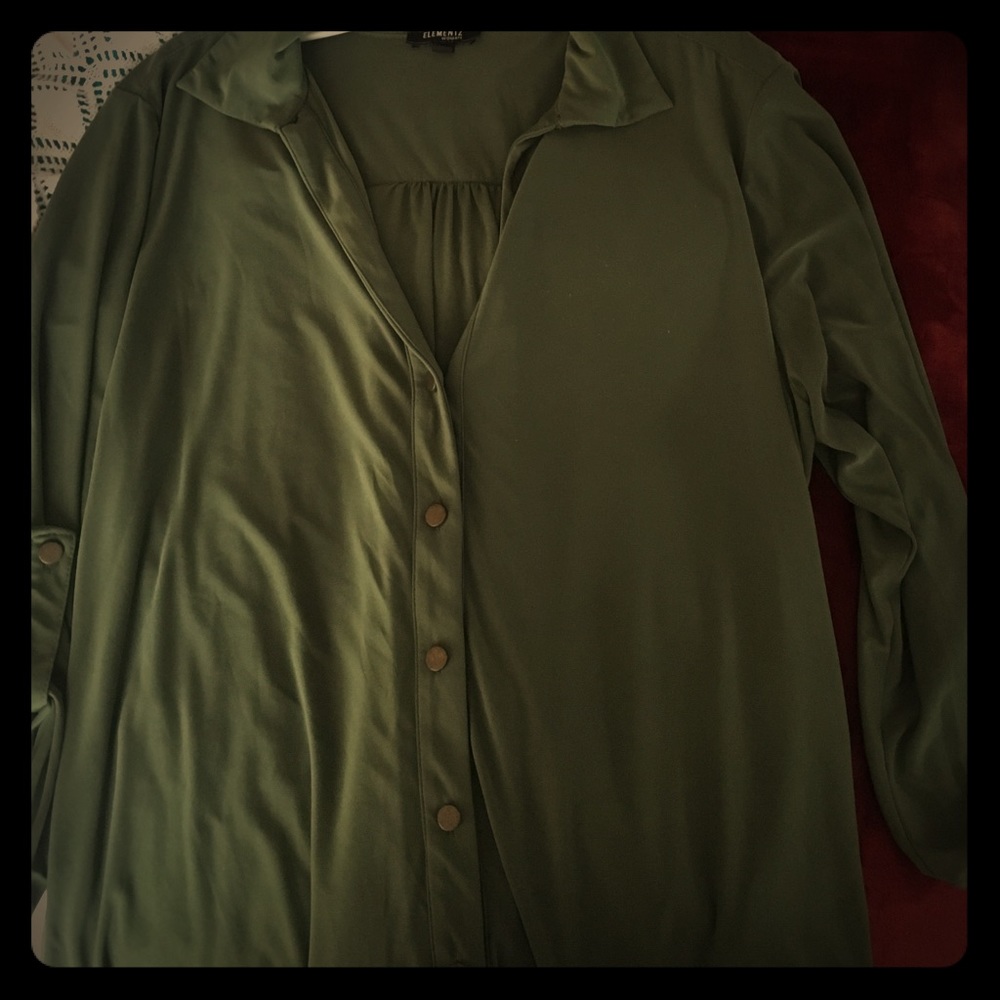 blouse with buttons on the front and the sleeves