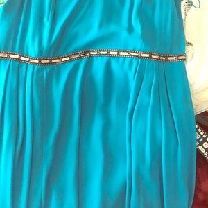 Sharkbite cut cocktail dress