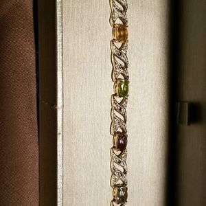 Multi-colored gem gold plated bracelet never worn