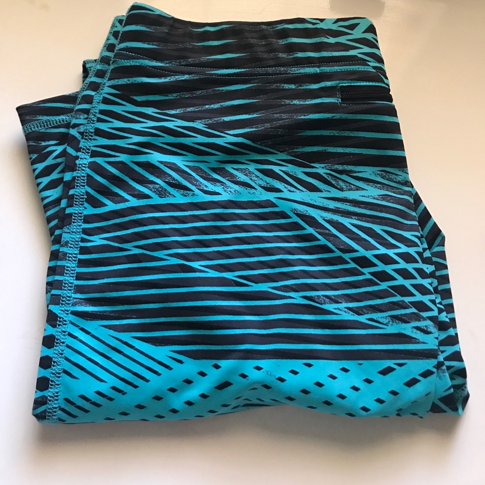 Long teal and black workout leggings