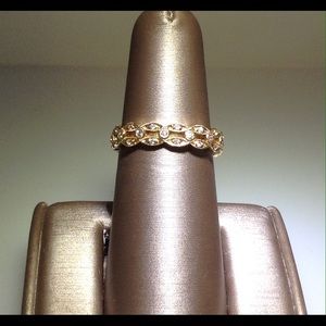 Gold and Diamond eternity band.