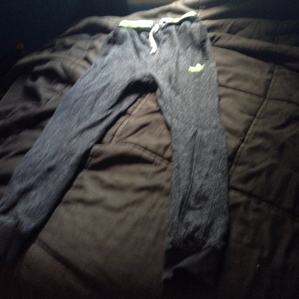 A black and gray and green mix white pants wi
