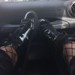 Black glossy converse sneakers