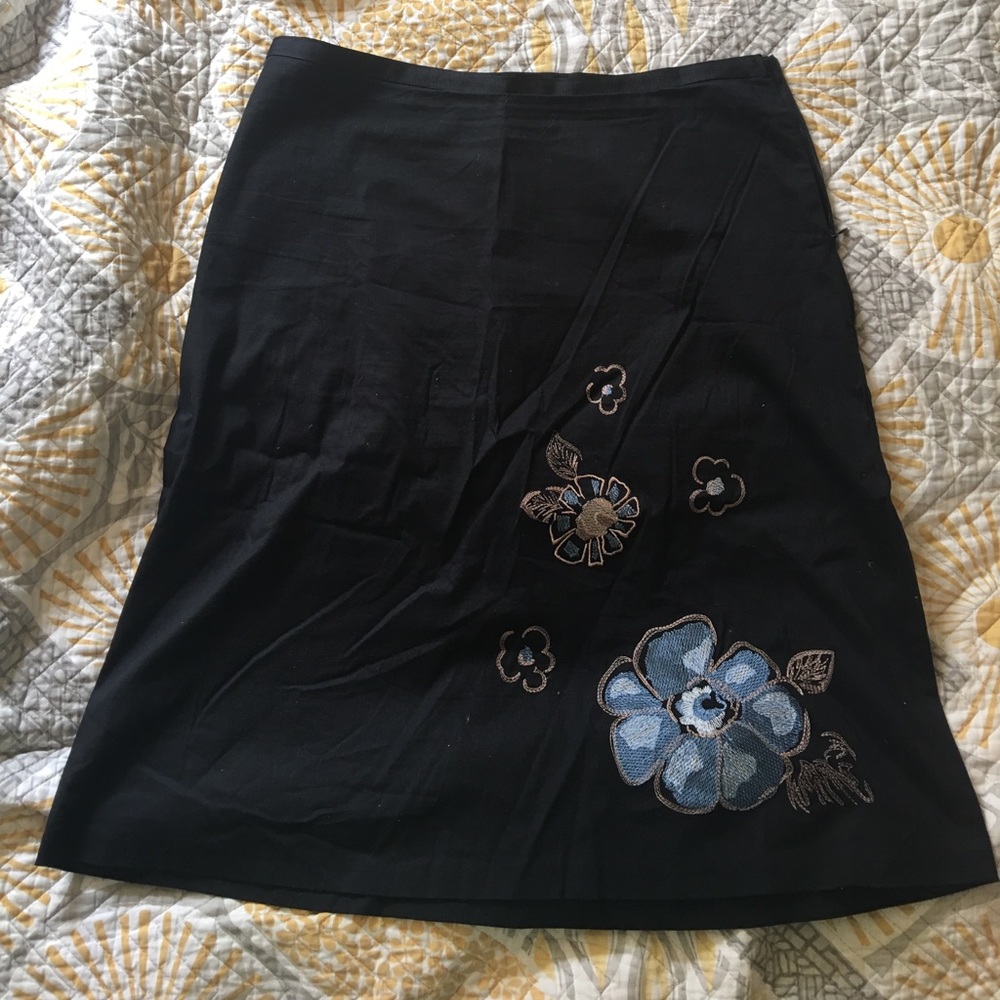 Black floral embroidered skirt.