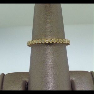 Yellow gold diamond eternity band.
