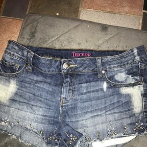 Lightly warn studded jean shorts