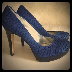 7.5, Calvin Klein royal blue heels.