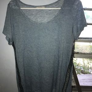 Blue top with tribal detail on the side