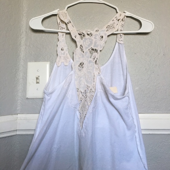 A white tank top with tan crochet detailing - Picture 2 of 2