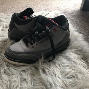 Grey, black and red Jordan's