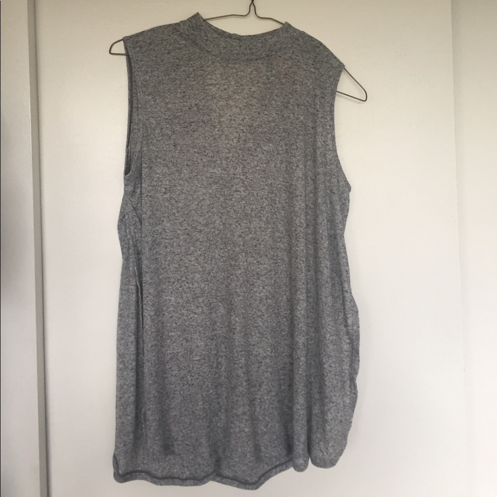 Dark gray ribbed tank with slits on the side.