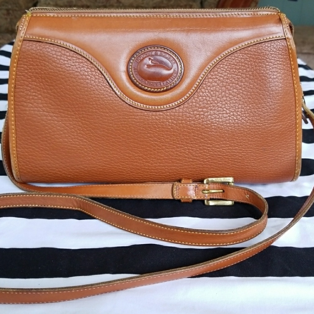 Authentic Dooney & Bourke all weather leather Zip