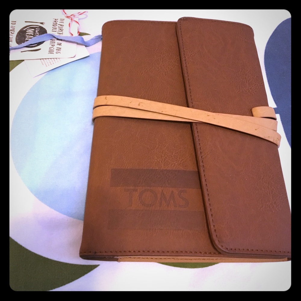 Journal about 8-9 inches tall, 6 in closed