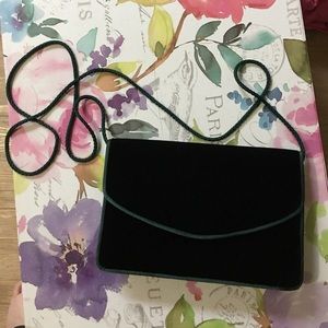 Dark green velvet handbag