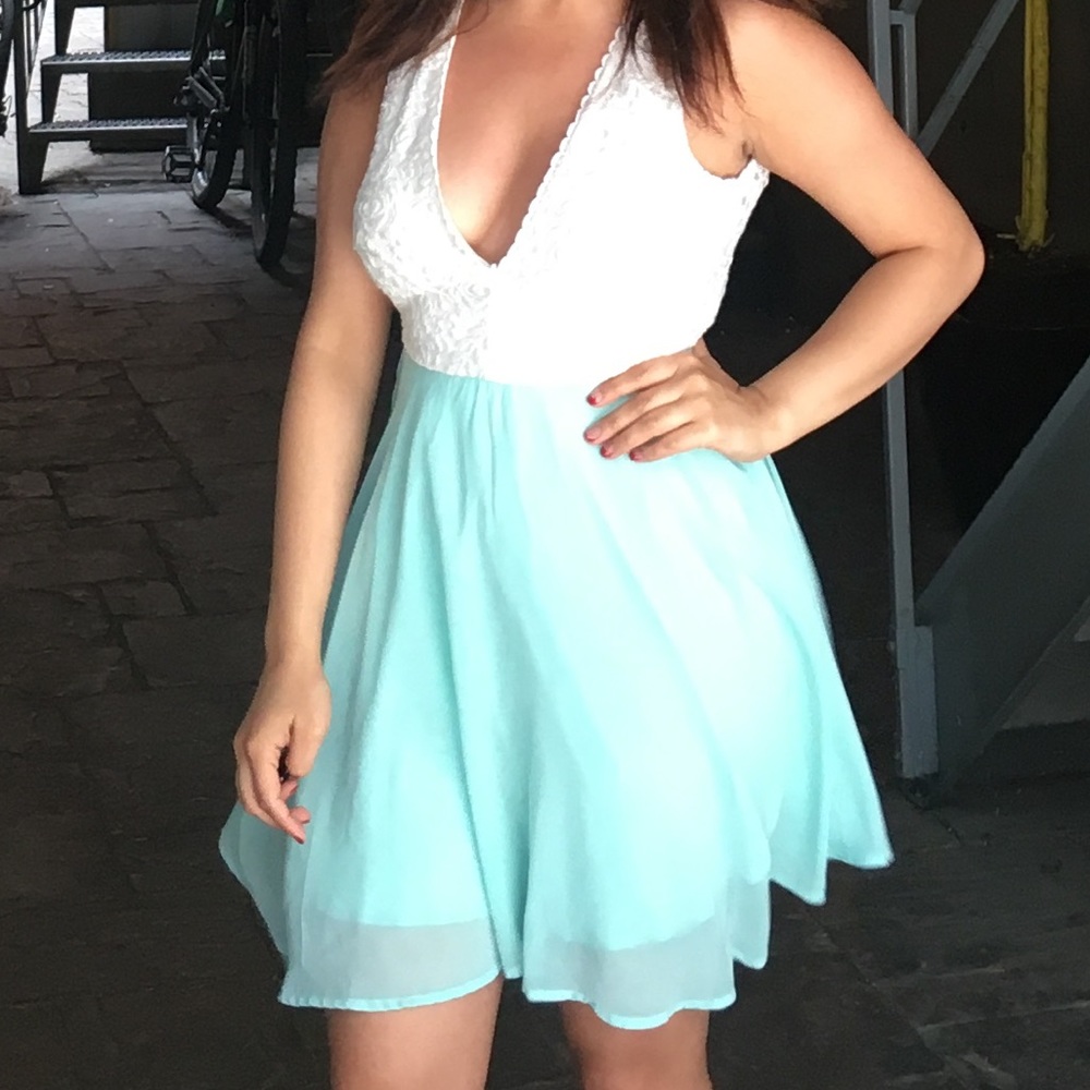 Low cut turquoise and white lace dress