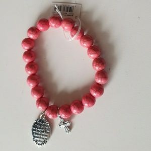 Pink beaded bracelet with cross and Bible quote
