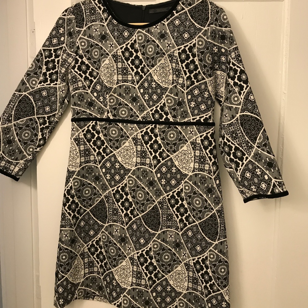 Zara's dress, with black and white flowers.