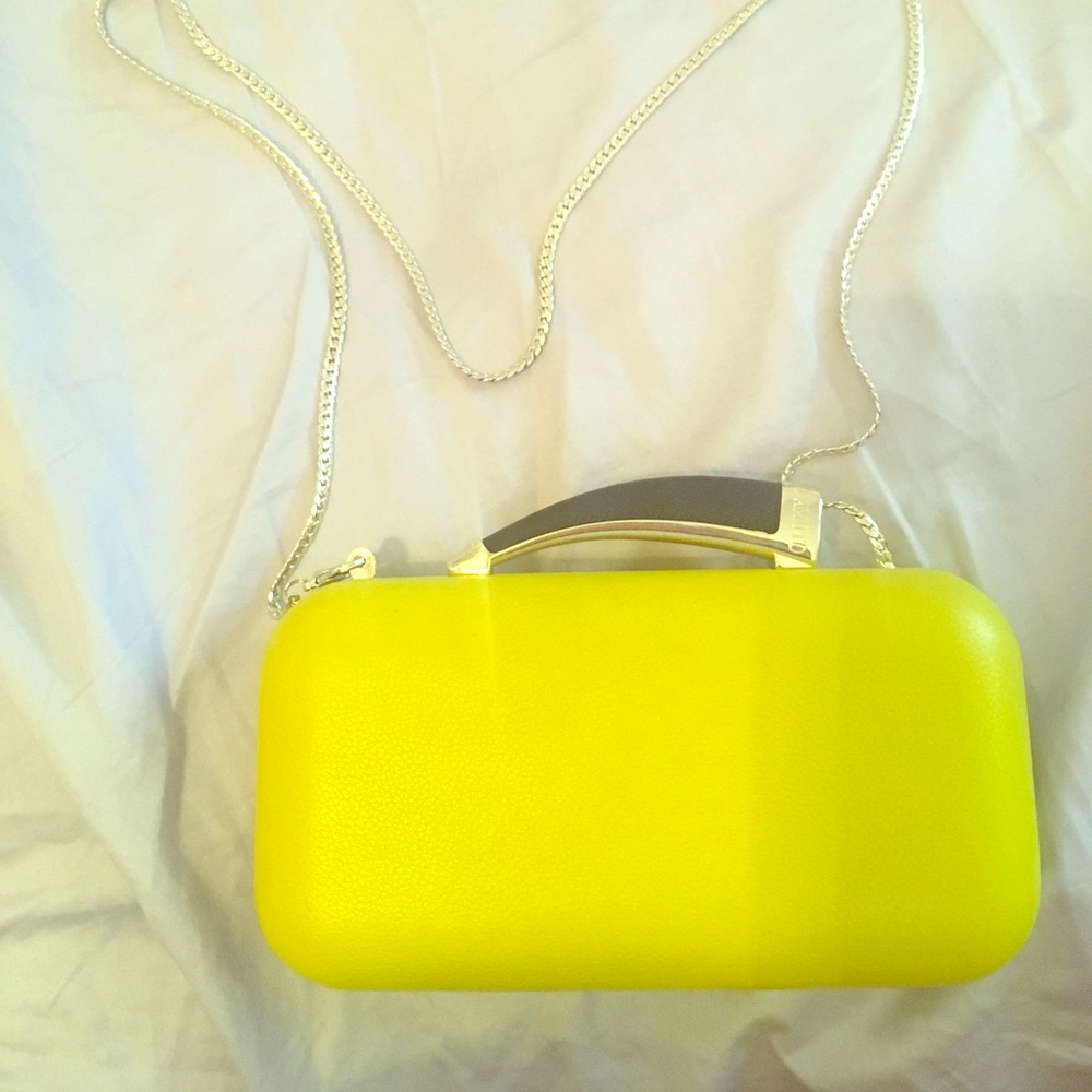 Vince Camuto horn clutch