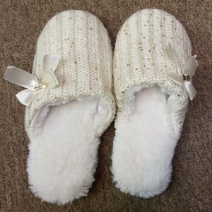 White and gold fuzzy slippers