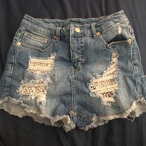 Distressed jean shorts