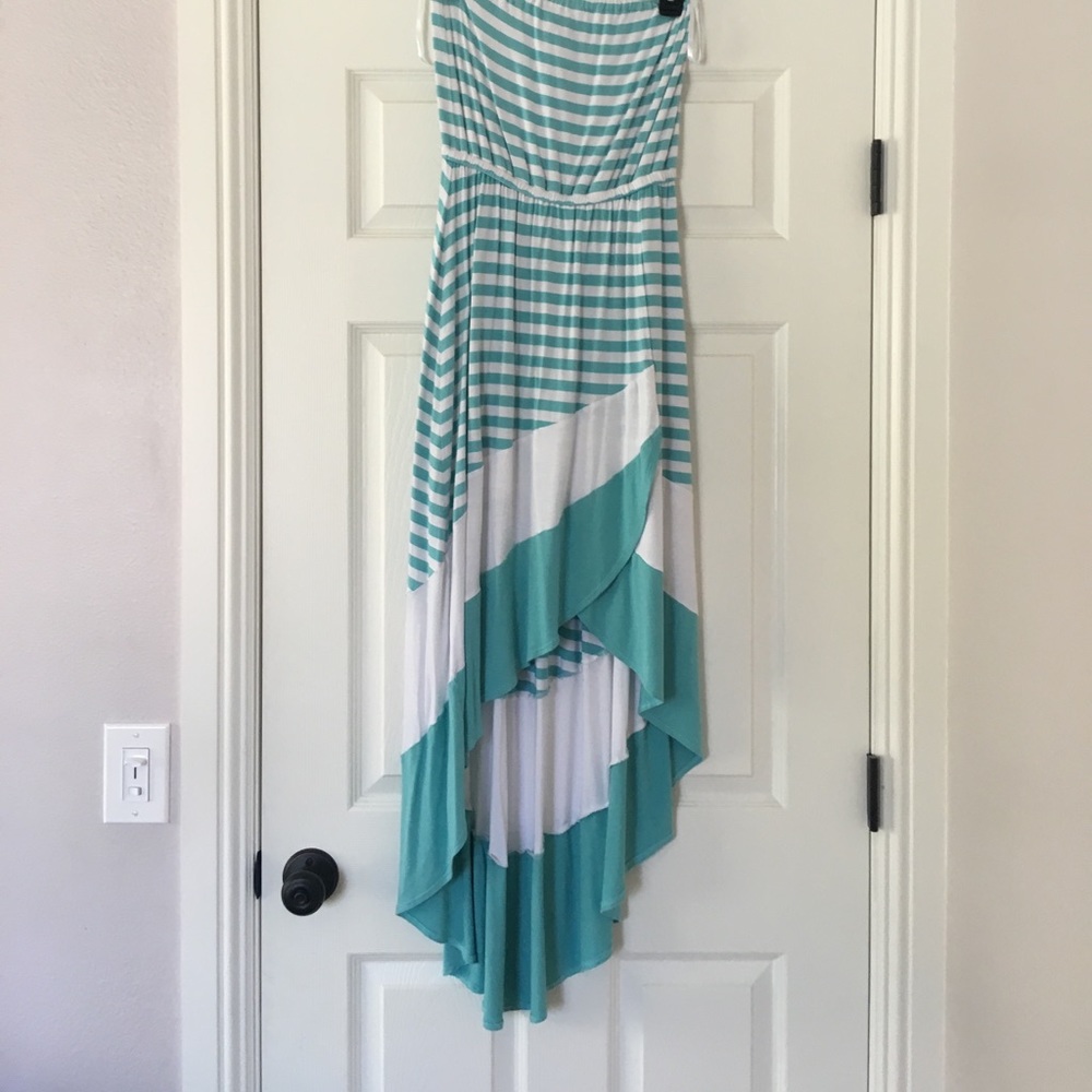 Striped high low dress by Bebe. Worn only once.