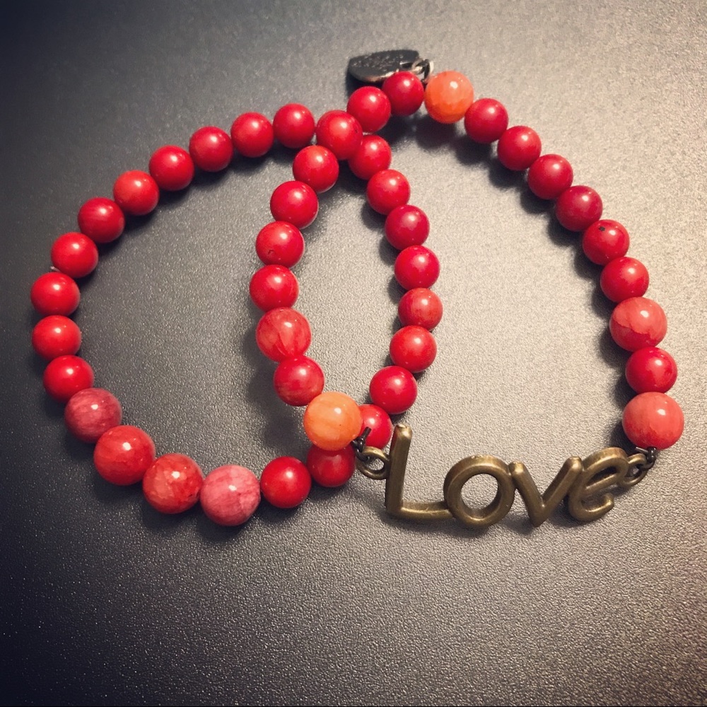 His and Hers red bead bracelets